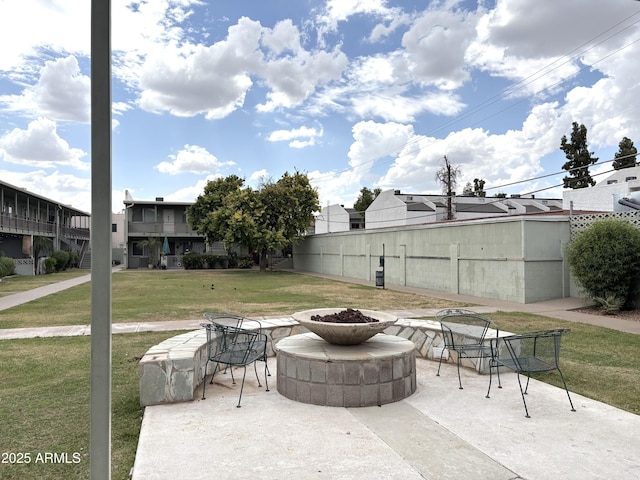 1702 W Tuckey Ln Unit 209, Phoenix, AZ 85015 - view of patio with a fire pit