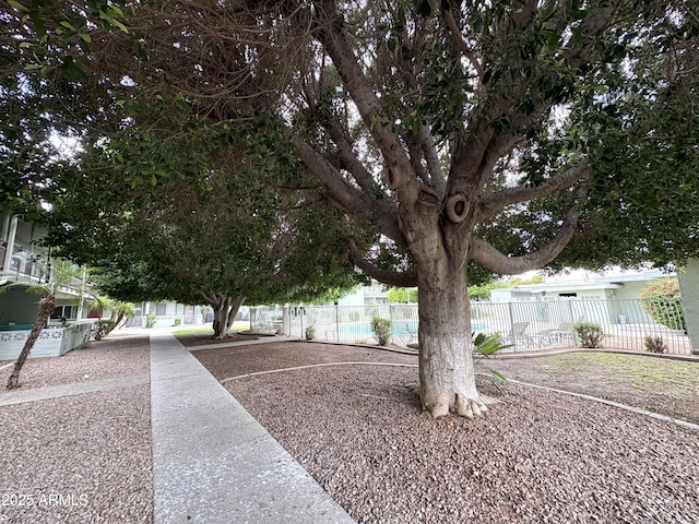 1702 W Tuckey Ln Unit 209, Phoenix, AZ 85015 - view of property's community with fence and a pool