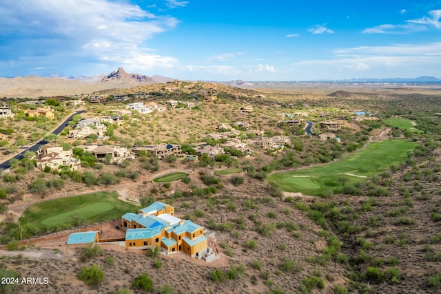 birds eye view of property featuring view of golf course and a mountain view