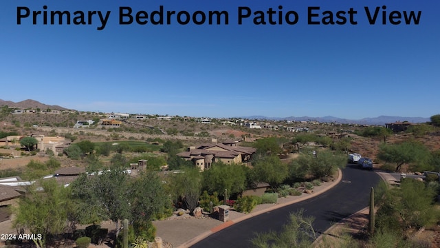 drone / aerial view featuring a mountain view