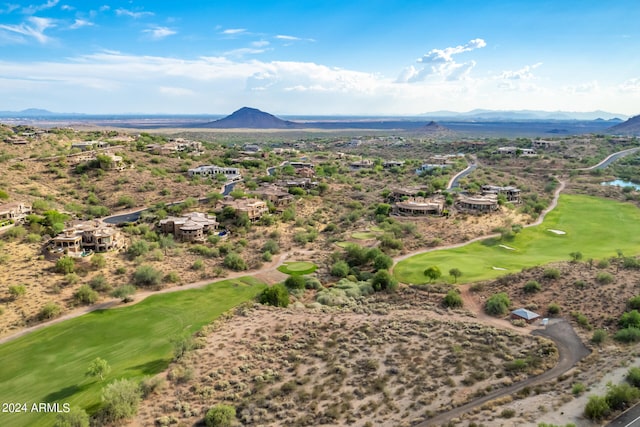 birds eye view of property featuring a mountain view