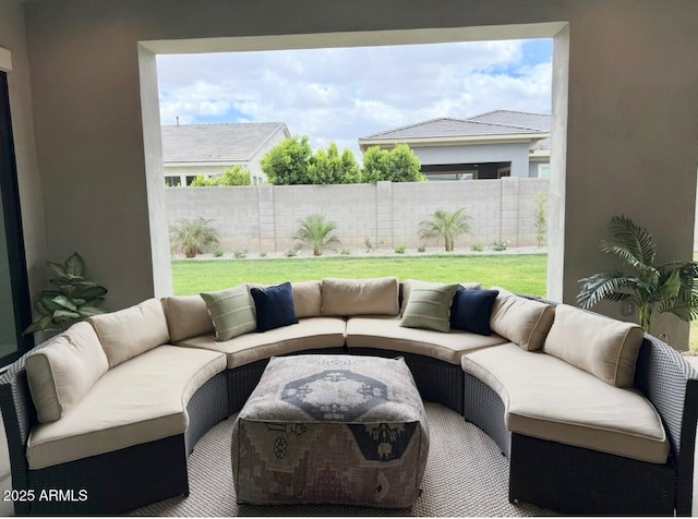 view of patio / terrace featuring fence and an outdoor hangout area