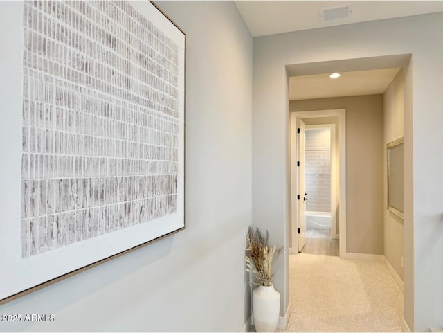 hallway with baseboards, carpet flooring, recessed lighting, and visible vents