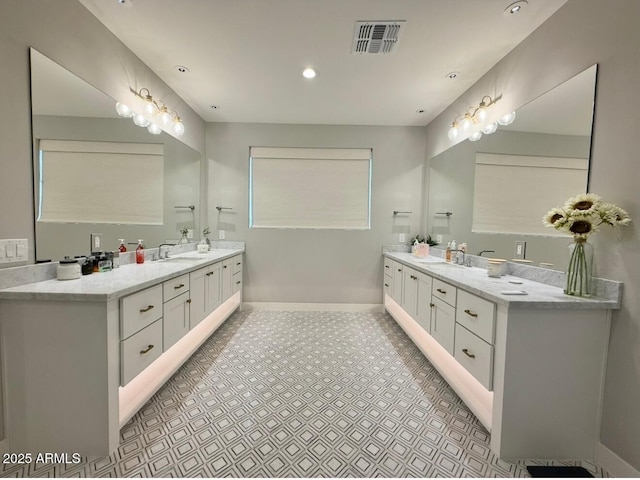 full bathroom featuring recessed lighting, baseboards, visible vents, and vanity