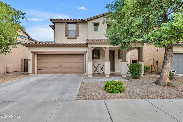 view of front of home with a garage