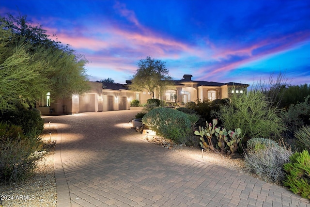 view of front of property featuring a garage