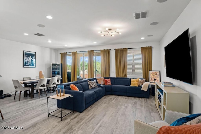 435 E Shellie Ct, Casa Grande, AZ 85122 - living area featuring light wood-type flooring and recessed lighting