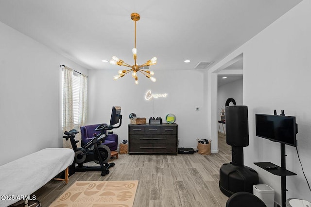 435 E Shellie Ct, Casa Grande, AZ 85122 - exercise area featuring wood finished floors, a chandelier, and recessed lighting