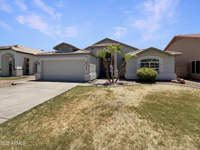 317 E Nunneley Rd, Gilbert, AZ 85296 - view of front facade with stucco siding, a garage, concrete driveway, and a tile roof