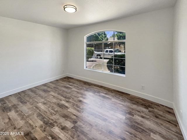 317 E Nunneley Rd, Gilbert, AZ 85296 - empty room featuring wood finished floors and baseboards