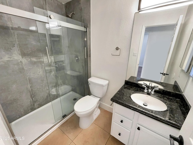 317 E Nunneley Rd, Gilbert, AZ 85296 - bathroom with vanity, a stall shower, and tile patterned flooring