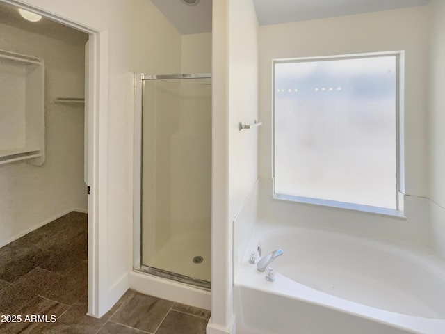317 E Nunneley Rd, Gilbert, AZ 85296 - full bath with a walk in closet, a garden tub, and a stall shower