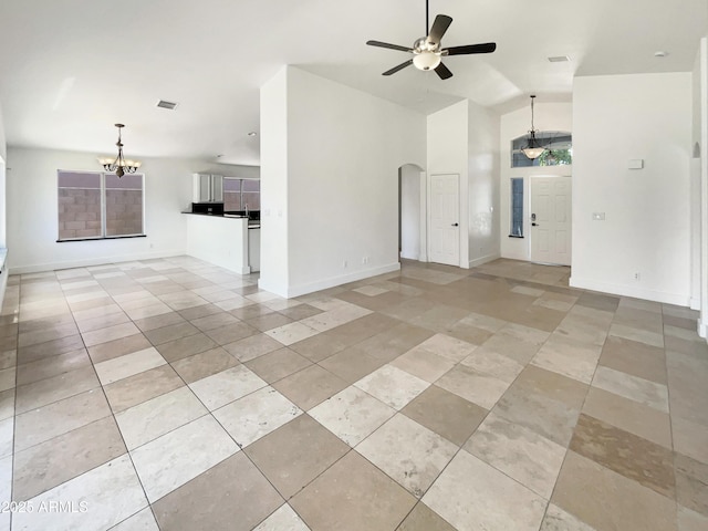 317 E Nunneley Rd, Gilbert, AZ 85296 - unfurnished living room with a chandelier, arched walkways, ceiling fan, high vaulted ceiling, and light tile patterned floors