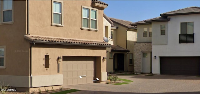 view of front of home with a garage