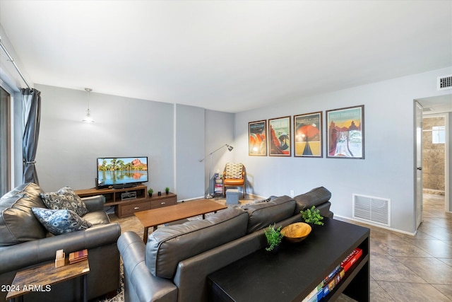 living room featuring tile patterned floors