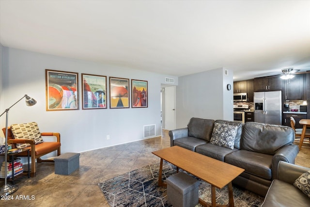 living room featuring ceiling fan