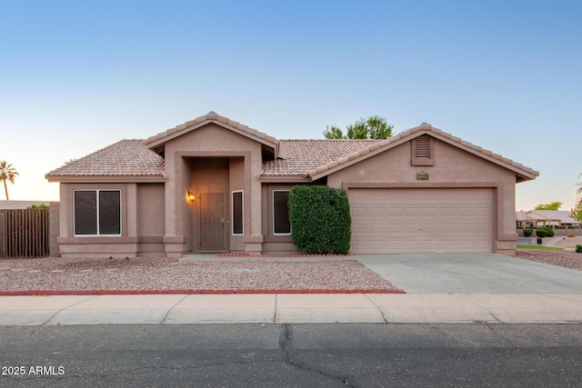 1220 S Wagon Wheel Dr, Chandler, AZ 85286 - single story home with an attached garage, stucco siding, fence, and concrete driveway