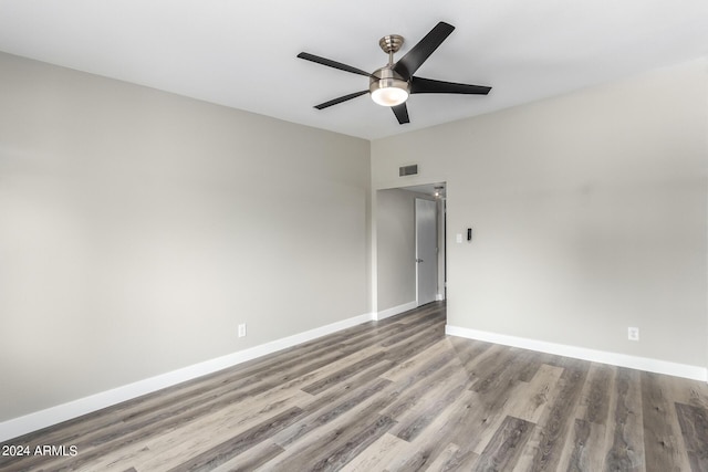 unfurnished room featuring ceiling fan and light wood-type flooring