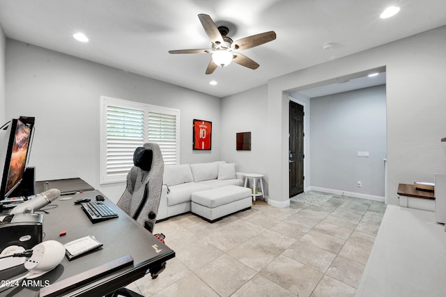 tiled office space with ceiling fan