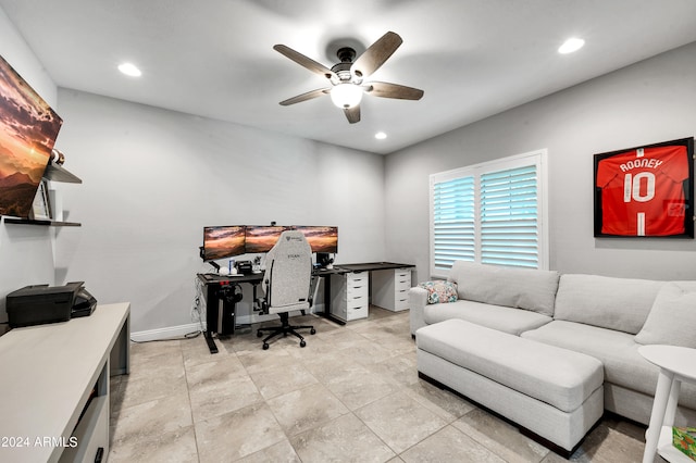 tiled office featuring ceiling fan