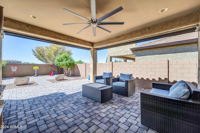 view of patio featuring an outdoor living space and ceiling fan