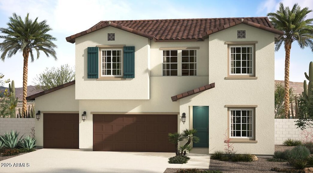 mediterranean / spanish house featuring a garage