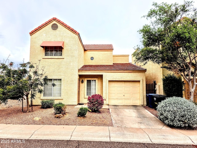 1020 W Pisces Dr, Tempe, AZ 85283 - mediterranean / spanish-style home featuring concrete driveway, stucco siding, an attached garage, and a tile roof
