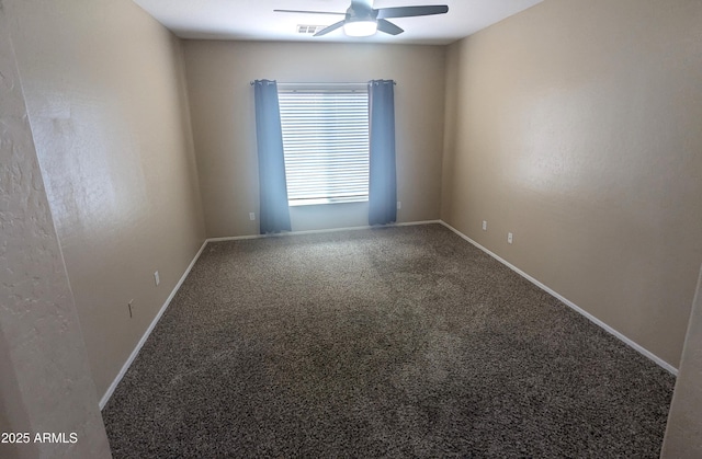 14841 W Desert Hills Dr, Surprise, AZ 85379 - spare room with ceiling fan, carpet, and baseboards