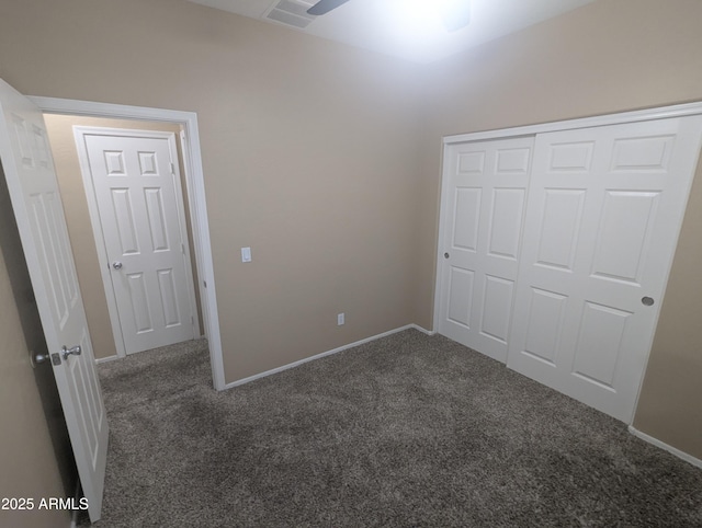 14841 W Desert Hills Dr, Surprise, AZ 85379 - unfurnished bedroom with carpet floors, a closet, and baseboards