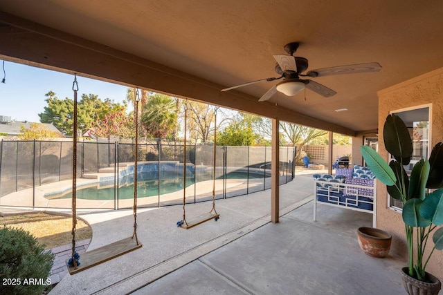 view of patio / terrace featuring a fenced in pool