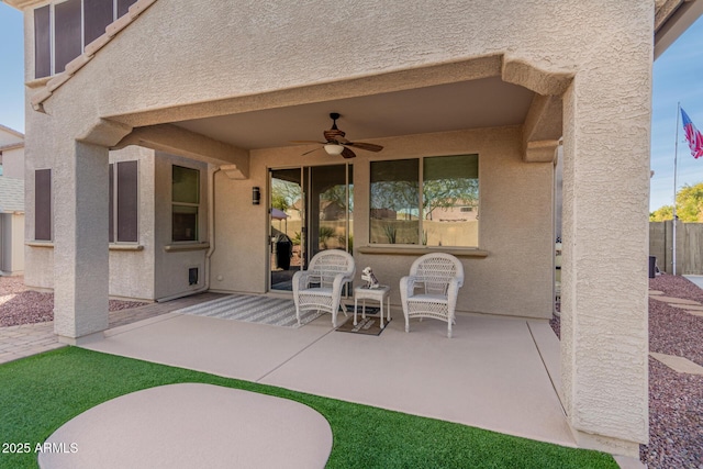 view of patio with ceiling fan