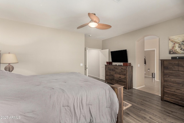 bedroom with ceiling fan and light hardwood / wood-style floors