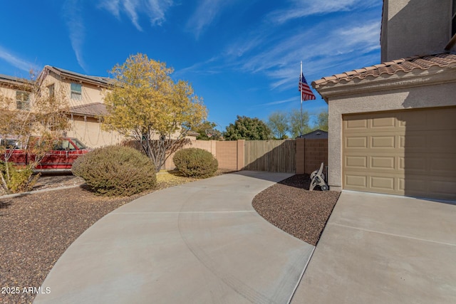 exterior space with a garage