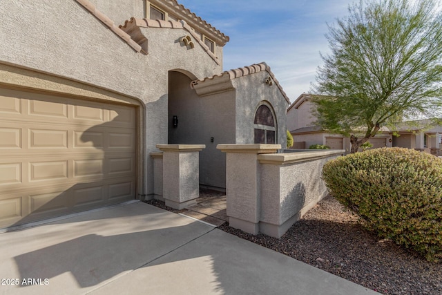 view of patio featuring a garage