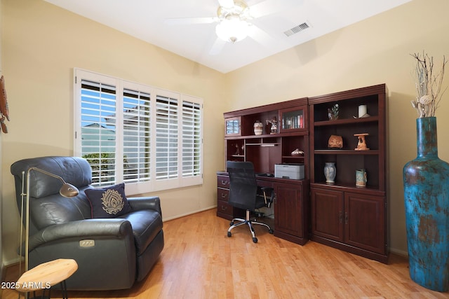 office with ceiling fan and light wood-type flooring