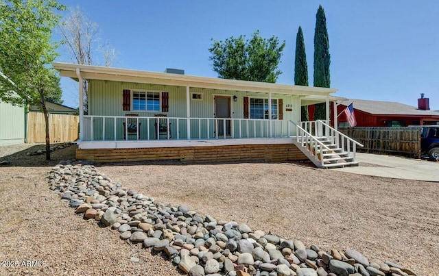 single story home with covered porch