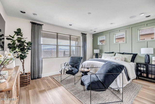 bedroom with light wood-type flooring