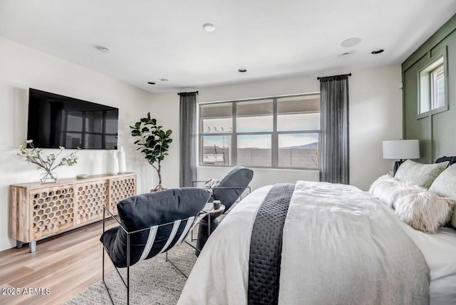 bedroom featuring light hardwood / wood-style floors