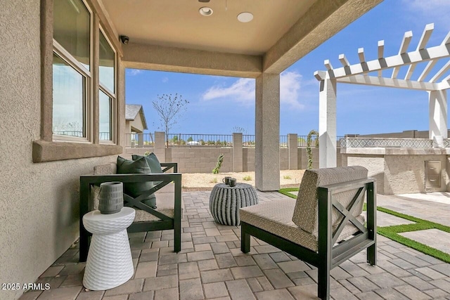 view of patio / terrace featuring a pergola