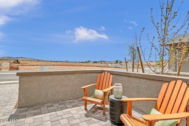 view of patio featuring a mountain view