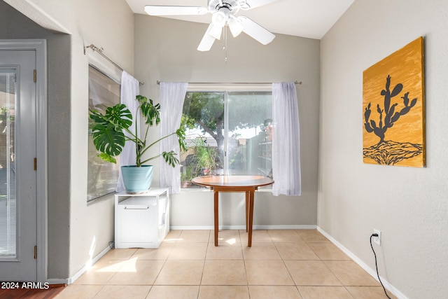 interior space featuring ceiling fan and vaulted ceiling