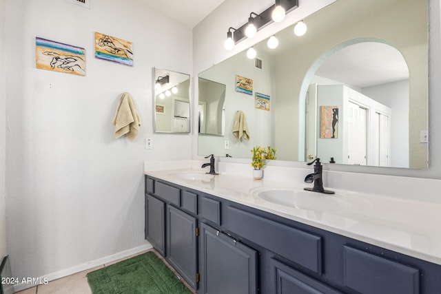 bathroom featuring tile patterned floors and vanity