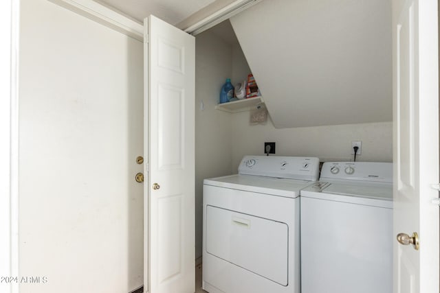 laundry room with washer and clothes dryer