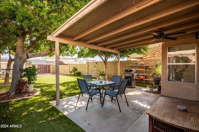 view of patio / terrace with ceiling fan and area for grilling