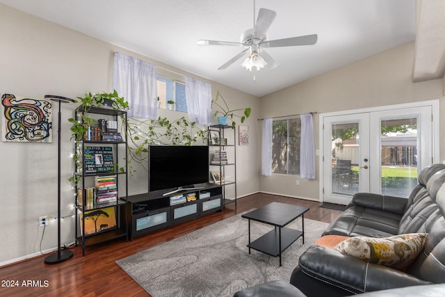 living room with ceiling fan, french doors, dark hardwood / wood-style floors, and vaulted ceiling