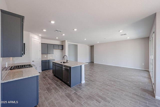 17716 W Fulton St, Goodyear, AZ 85338 - kitchen with appliances with stainless steel finishes, recessed lighting, baseboards, backsplash, and visible vents