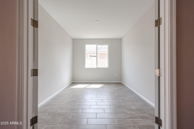 17716 W Fulton St, Goodyear, AZ 85338 - empty room featuring baseboards