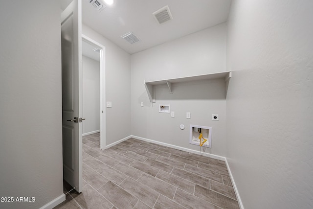 17716 W Fulton St, Goodyear, AZ 85338 - washroom featuring gas dryer hookup, hookup for an electric dryer, laundry area, visible vents, and hookup for a washing machine
