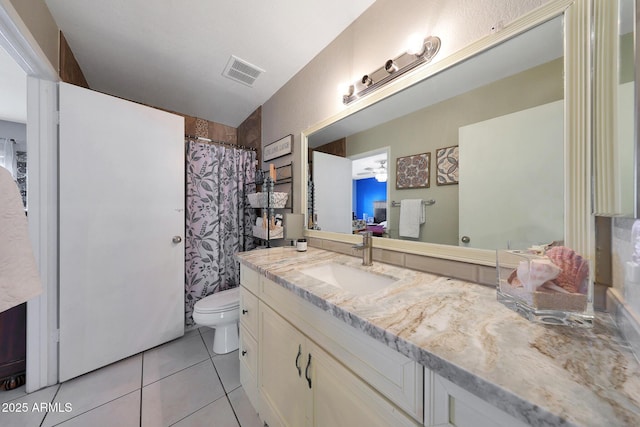 bathroom featuring curtained shower, tile patterned flooring, toilet, vanity, and visible vents