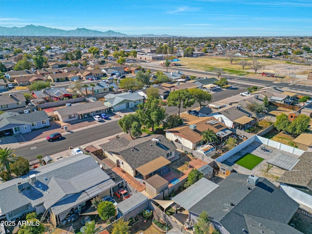 drone / aerial view with a residential view and a mountain view